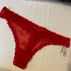 Red lace w/ hearts and bow cutout in back